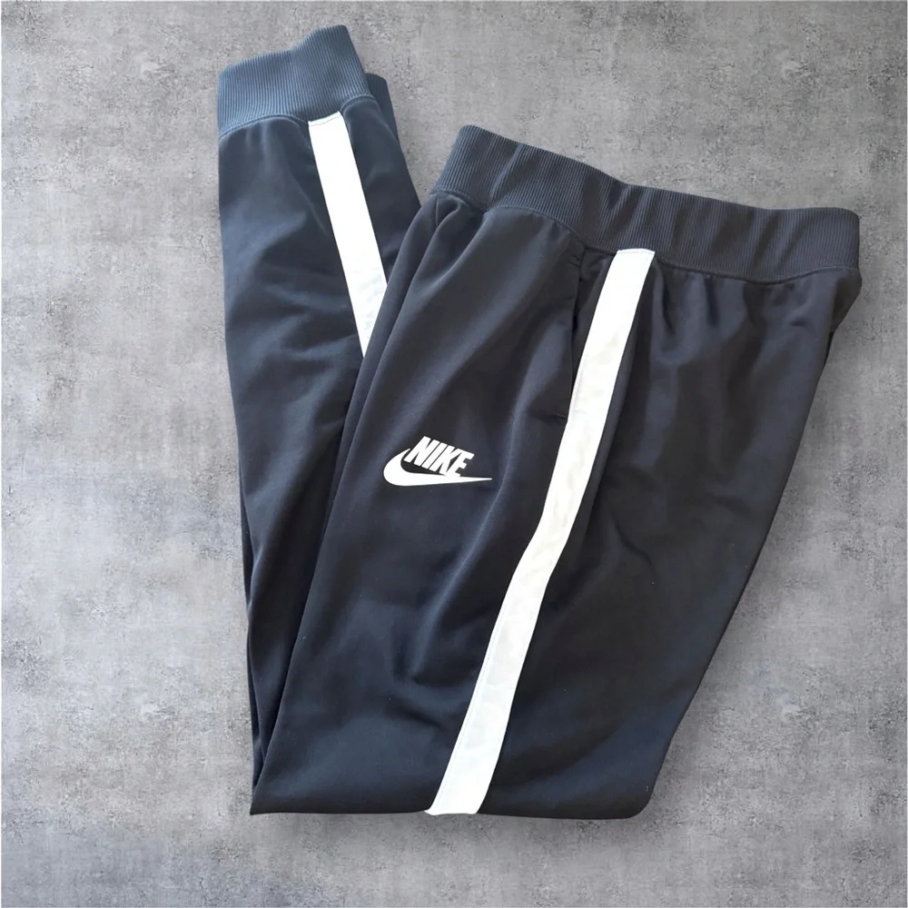 NIKE Sportswear Track Pants Women’s Small Black White Stripe 850452-010